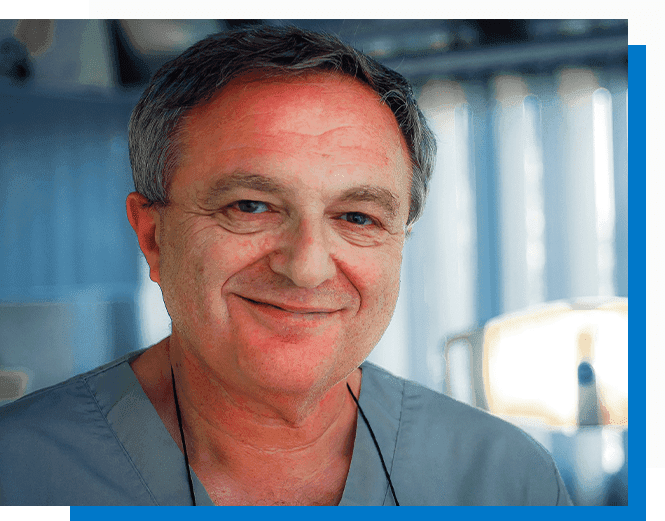 Dr. Miroshnik Vladislav in scrubs in his clinic